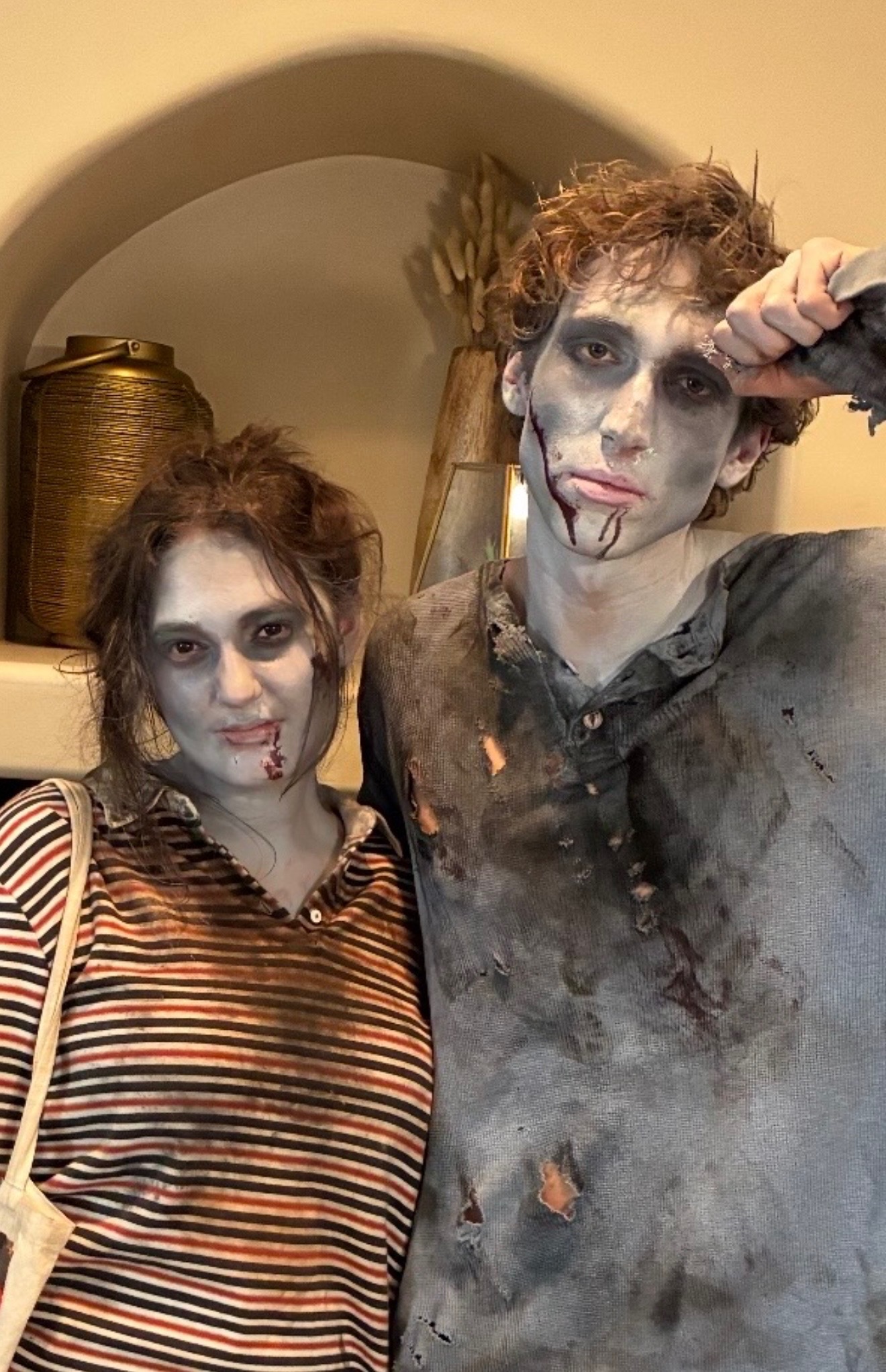 A closer shot of Mel and Kimberly Dott in zombie makeup on set